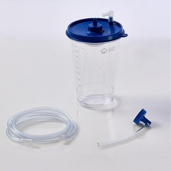 Clear plastic nebulizer kit with tubing and blue lid components.