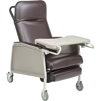 A medical recliner chair with armrest table and wheels.