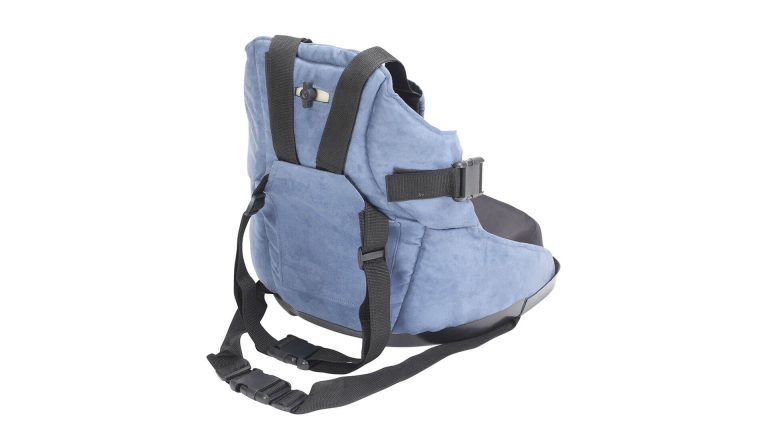 Blue baby carrier with adjustable straps and buckles.