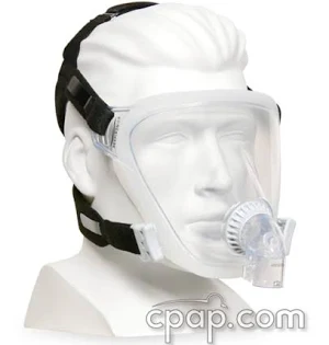 Clear CPAP full face mask on a mannequin head.